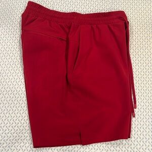 Lululemon men’s size medium red athletic shorts with brief liner